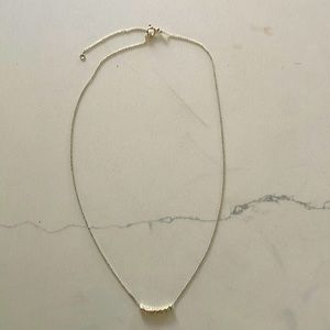 Silver necklace with 7 floating silver beads; 16”-18”